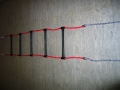 Strickleiter  / (Material) aus Seil mit Stahleinlage